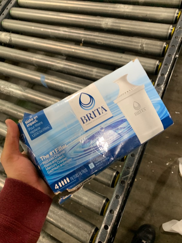 Photo 1 of Brita Standard Water Filter for Pitchers and Dispensers, BPA-Free, Reduces Copper, Cadmium and Mercury Impurities, Lasts Two Months or 40 Gallons, Includes 4 Filters for Pitchers