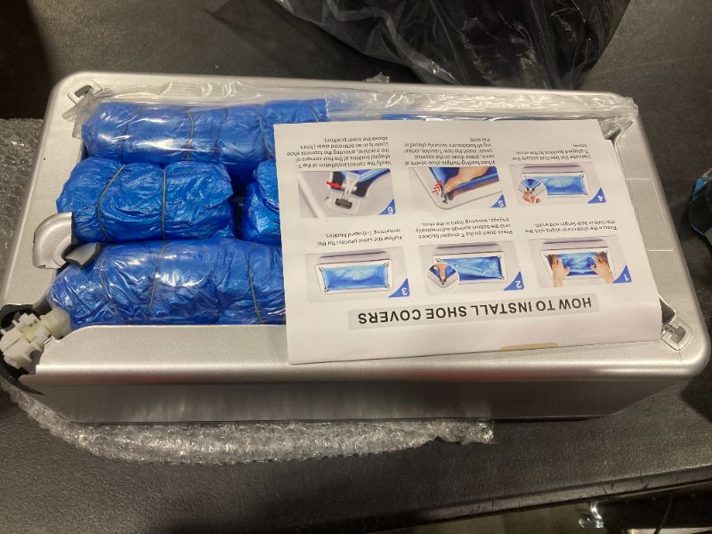 Photo 1 of *** PLEASE SEE NOTE *** Shoe Covers Dispenser with 200pcs Shoe Cover Disposable Non Slip, User-Friendly and Reliable Shoe Cover Machine, Fits Size Up to 11 US Men, Widely Applicable in Indoor(Silver)