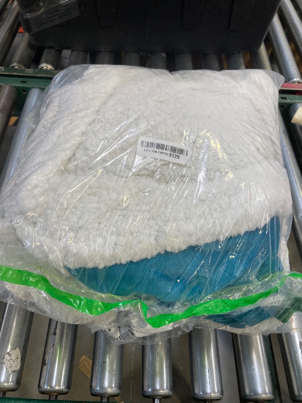 Photo 1 of  Reversible Fleece to Sherpa Heated Throw, Plush