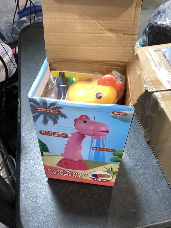 Photo 1 of Miortior Drawing Projector for Kids,Tracing and Drawing Projector with 96 Slide Cartoon Patterns and 12 Color Brushes,Smart Art Sketcher Projector for 3+ Year Old Girls & Boys (Yellow)