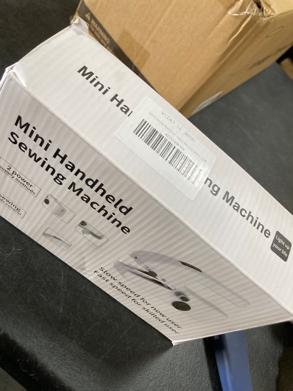 Photo 1 of Cordless Handheld Sewing Machine – Portable Mini Stitching Machine for Quick Repairs, Travel Sewing Kit, Small Sewing Machine for Home, DIY, and Emergency Fixes