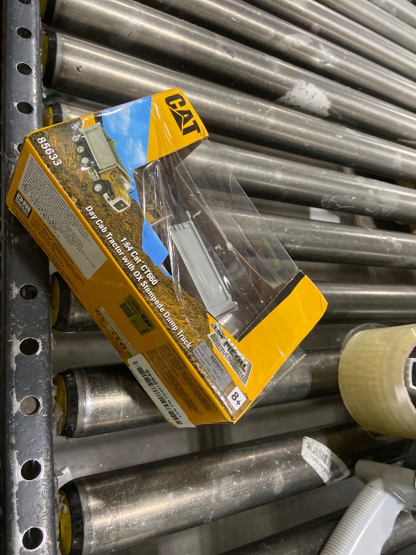 Photo 1 of 1:64 Caterpillar CT660 McNeilus Bridgemaster Concrete-Mixer - Diecast Masters - 85632 - Play & Collect