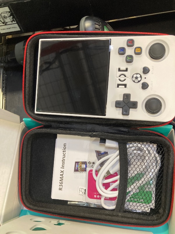 Photo 1 of ?R36MAX 4000mAh Portable Rechargeable Handheld Retro Game Console,Comfort Non-Slip Handheld Standing Retro Game Console with 64G TF Car,4.0-inch Screen,for Office,White