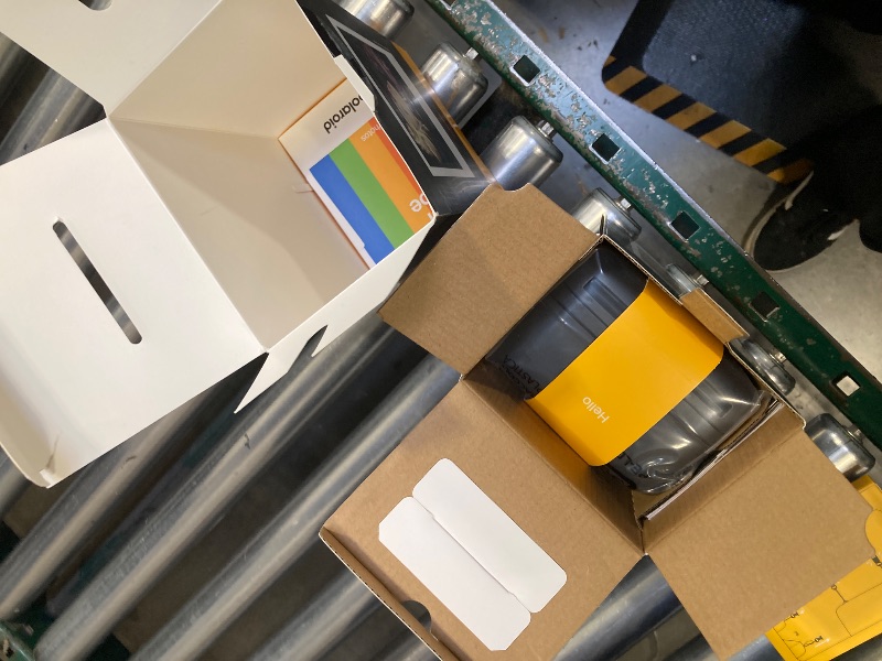 Photo 1 of Polaroid Flip Instant Camera + Color Film Bundle (16 Photos Included) - Black (6565) - Hyperfocal 4-Lens System, Sonar autofocus, and Sence Analysis with Bluetooth paired Companion app