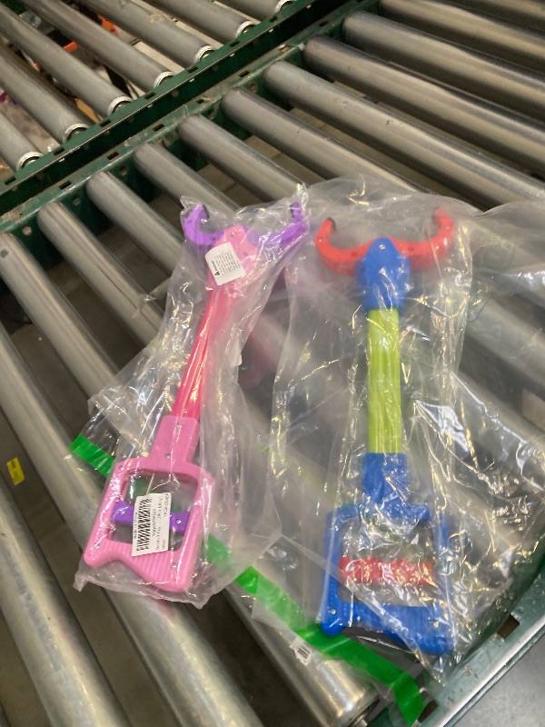 Photo 1 of 2 toy grabbers 