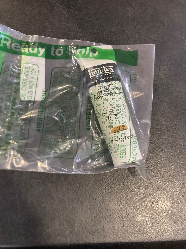 Photo 1 of Liquitex Professional Heavy Body Acrylic Paint, 2-oz (59ml) Tube, Raw Umber