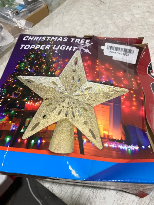 Photo 1 of 10" Christmas Tree Topper Projector with 6 Projection Modes, Built-in LED Rotating Light, 3D Glitter Dynamic Projector Light Up Xmas Tree Topper Star for Christmas Holiday Party Decorations Gifts