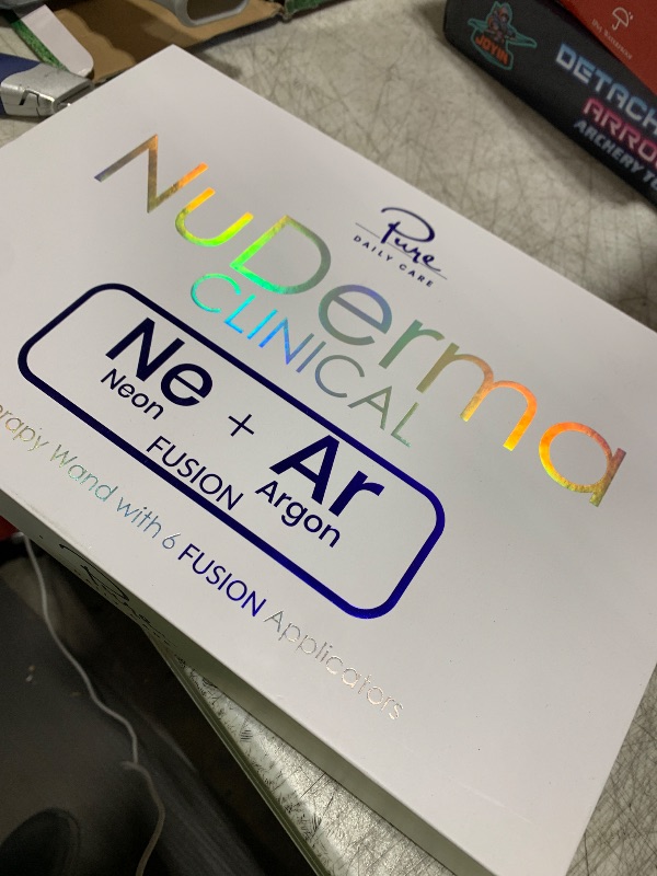 Photo 1 of Pure Daily Care NuDerma Clinical Portable Skin Therapy Wand, Machine with 6 Fusion Neon + Argon Wands – Anti Aging - Clarifying - Skin Tightening & Radiance - Wrinkle Reducing