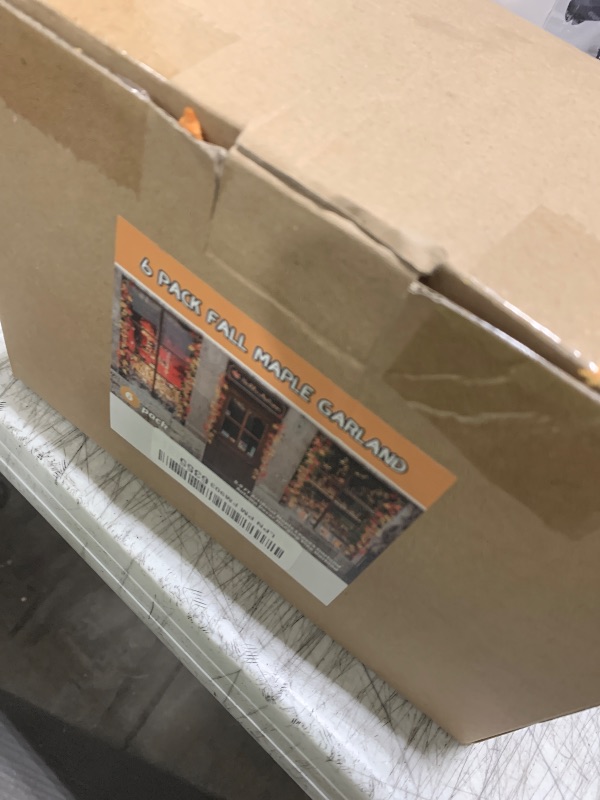 Photo 1 of MorTime 6 Pack Fall Maple Garland, 5.9 FT Artificial Maple Leaves Autumn Decor Hanging Vine for Indoor Outdoor Thanksgiving Party Wedding Decorations