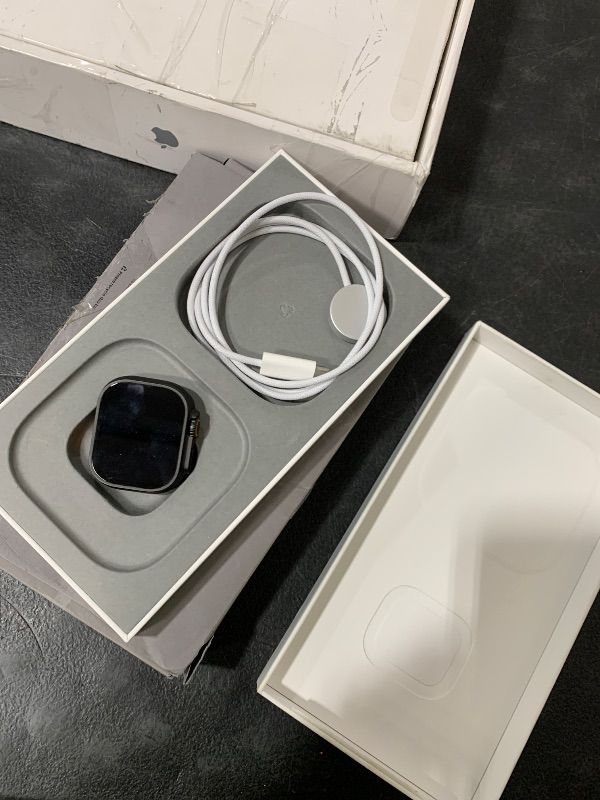 Photo 1 of Apple Watch Ultra 2 [GPS + Cellular 49mm] Smartwatch, Sport Watch with Black Titanium Case with Dark Green Alpine Loop - M. Fitness Tracker, Precision GPS, Action Button, Carbon Neutral