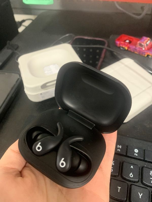 Photo 4 of Beats Powerbeats Fit - Wireless Noise Cancelling Workout Earbuds with Secure-Fit Wingtips, Up to 30-Hour Battery Life, Sweat & Water Resistant, Apple & Android Compatible - Jet Black