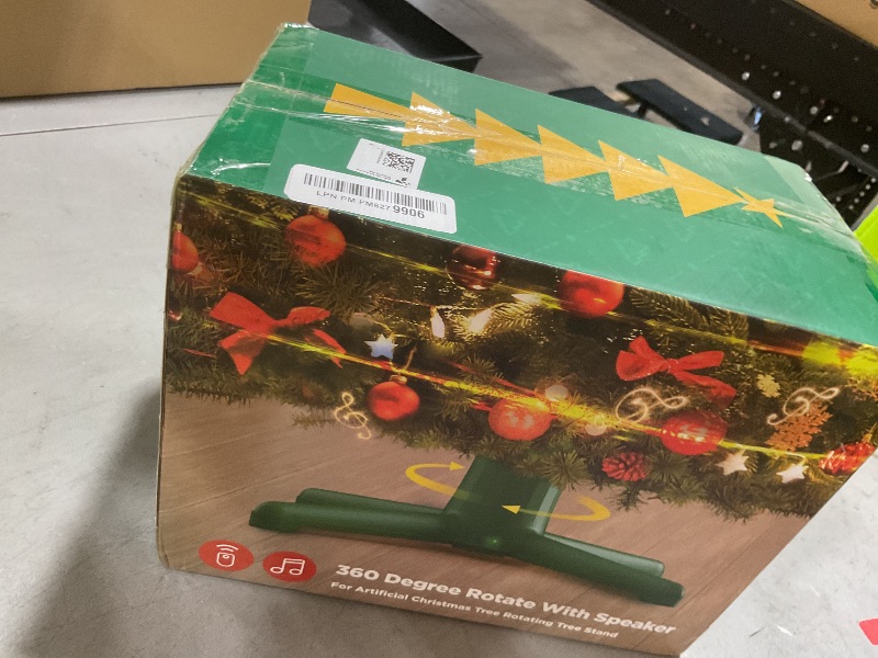 Photo 1 of ?Patent Pending? Musical Rotating Christmas Tree Stand, UL Certified Up to 9ft 120 lb Artificial Christmas Tree with Speaker, Spinning Stand with Remote, Fit for 1.25-2" in Tree Poles - 800W