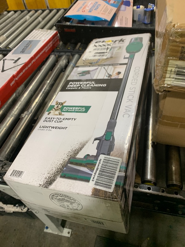 Photo 1 of Shark Corded Stick Vacuum, Ultra-Lightweight, Swivel Steering, Powerful Deep-Cleaning, Floor-to-Ceiling Versatility, Converts to a Handheld Vacuum, Carpets & Hardfloor, Green, CS110EM