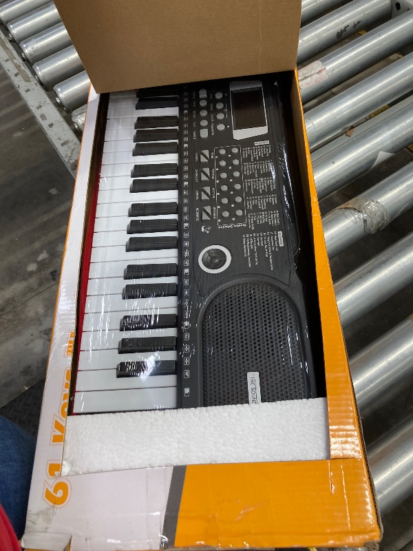 Photo 1 of **MISSING POWER CORD AND MICROPHONE**61 Keys Keyboard Piano, Electronic Digital Piano with Built-In Speaker Microphone, Sheet Stand and Power Supply, Portable Keyboard Gift Teaching for Beginners