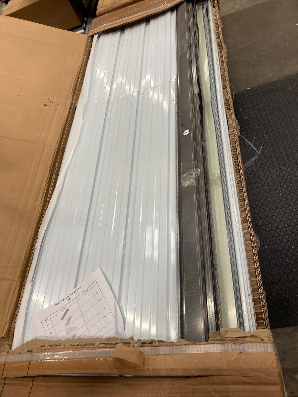 Photo 1 of **3 boxes**12' x 10' XL Outdoor Storage Shed