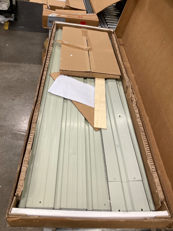 Photo 1 of **3 boxes**12' x 10' XL Outdoor Storage Shed