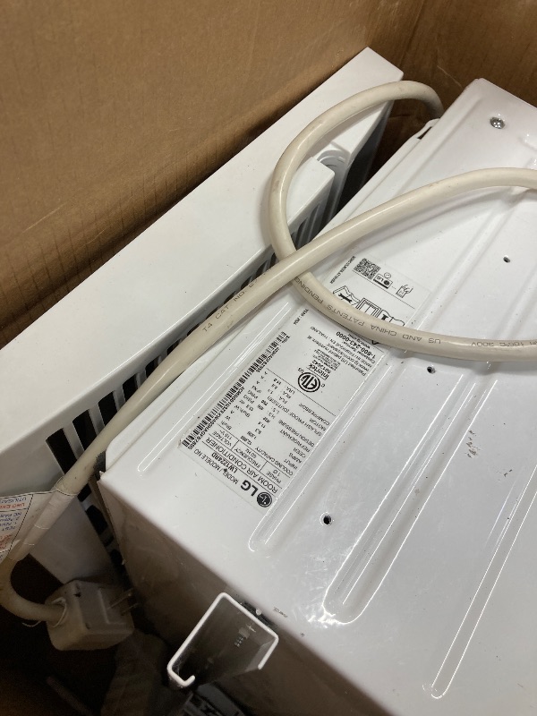 Photo 1 of **it has more damage**LG LW1224RD 12,000 Window Air Conditioner, 115V, 550 Sq.Ft. (22' x 25' Room Size), Quiet Operation, Electronic Control with Remote, 3 Cooling & Fan Speeds, Auto Restart, 12000 BTU, White