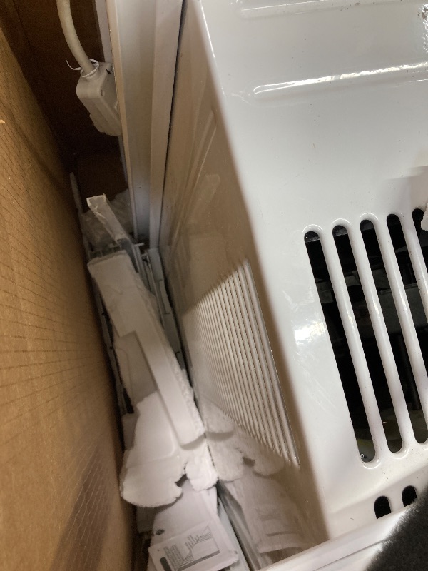 Photo 1 of **it has more damage**LG LW1224RD 12,000 Window Air Conditioner, 115V, 550 Sq.Ft. (22' x 25' Room Size), Quiet Operation, Electronic Control with Remote, 3 Cooling & Fan Speeds, Auto Restart, 12000 BTU, White