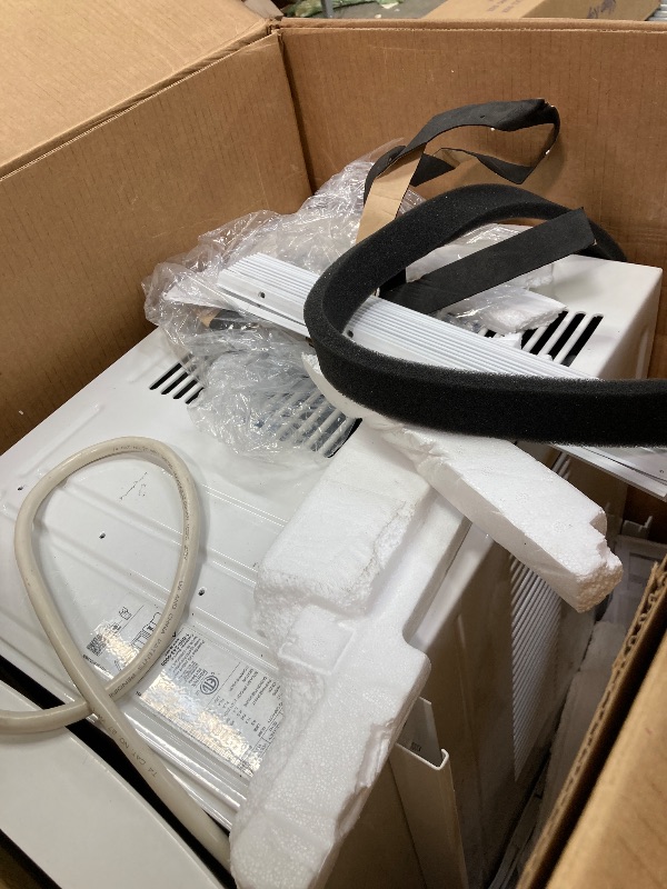 Photo 1 of **it has more damage**LG LW1224RD 12,000 Window Air Conditioner, 115V, 550 Sq.Ft. (22' x 25' Room Size), Quiet Operation, Electronic Control with Remote, 3 Cooling & Fan Speeds, Auto Restart, 12000 BTU, White