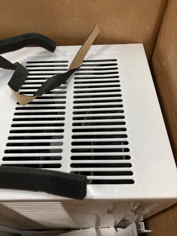 Photo 1 of **it has more damage**LG LW1224RD 12,000 Window Air Conditioner, 115V, 550 Sq.Ft. (22' x 25' Room Size), Quiet Operation, Electronic Control with Remote, 3 Cooling & Fan Speeds, Auto Restart, 12000 BTU, White