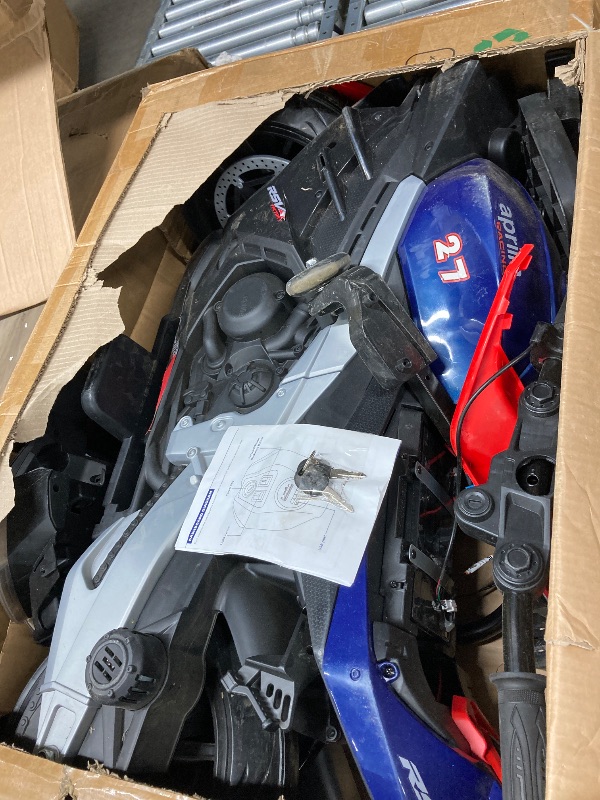 Photo 1 of 12V Kids Motorcycle, Electric Motorcycle for Kids with Long Battery Life, Top Speed to 3mph, Aprilia Licensed Ride On otorcycle with EVA Wheels, Training Wheels, Large Seat-Blue****USED****NEEDS TO BE CLEANED****