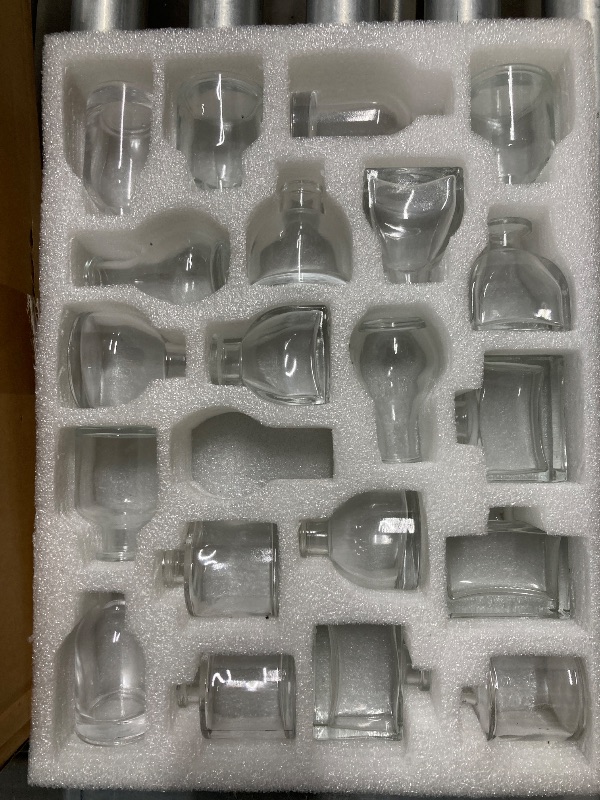 Photo 1 of ***(MISSING SOME VASES-INCOMPLETE-SELLING AS IS)***
 Glasseam Clear Glass Vases for Centerpieces: Mini Flower Vase Set 31Pcs Bud Vases in Bulk - Modern Small Vases for Home Room Wedding Party Dining Table Center Decor