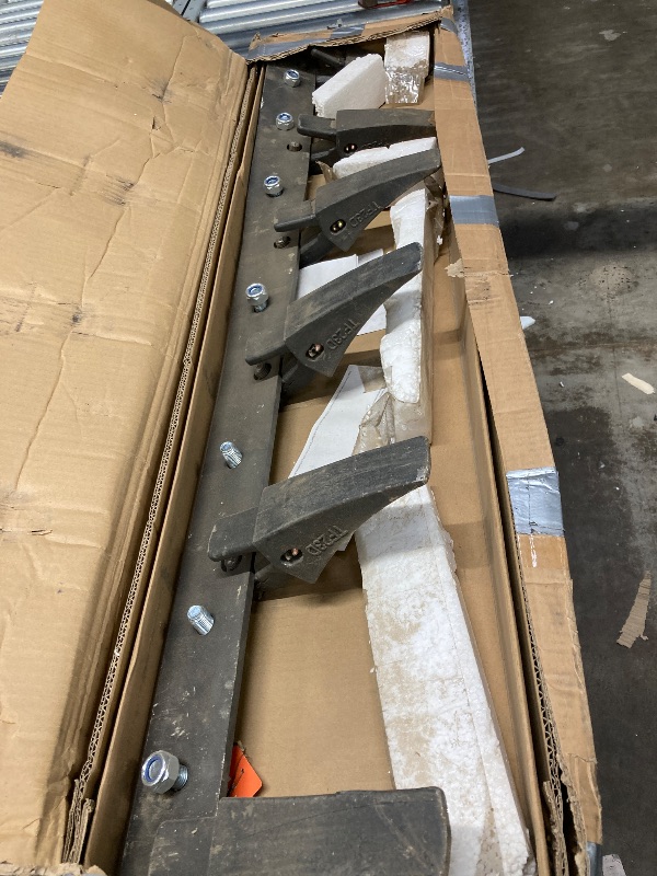 Photo 1 of *****the product is usedthey are missing pieces *****VEVOR Bucket Tooth Bar, 48'', Heavy Duty Tractor Bucket 6 Teeth Bar for Loader Tractor Skidsteer, 4560 lbs Load-Bearing Capacity Bolt On Design, for Efficient Soil Excavation and Bucket Protection
