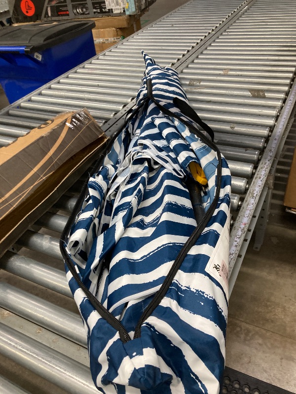 Photo 1 of ***used missing mparts****Blissun 9' Outdoor Patio Umbrella, Striped Patio Umbrella, Outdoor Table Umbrella, Market Umbrella with 8 Sturdy Ribs, Push Button Tilt and Crank (Blue & White Stripe)