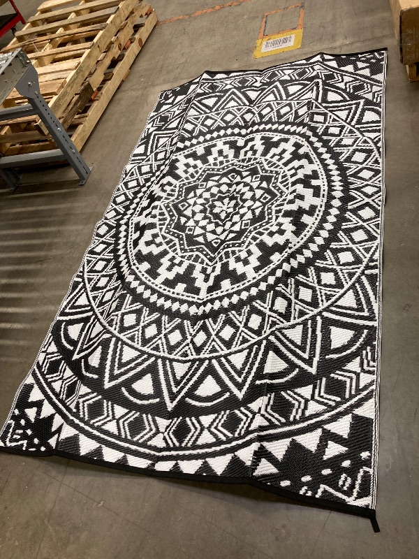 Photo 1 of ***ONE ROUND RUG  & ONE RECTANGLE RUG ***  
VUNATE Outdoor Patio Rug Clearance Plastic Waterproof Indoor Outdoor Mat for Picnic RV Porch Camping Reversible Lightweight Boho Outside Rug Black White