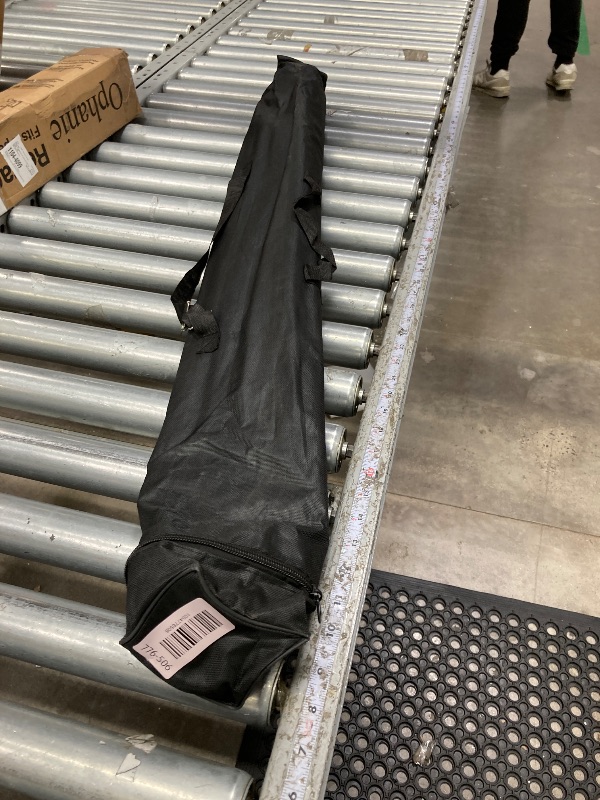 Photo 1 of **It is used and has some dents on the front stop**nley Adjustable X Banner Stand with Travel Bag - Fits Any Banner Size from 23" X 63" to 35" X 78" - Portable Retractable Stand for Business, Trade Shows, Events, and Displays (Banner Not Included)