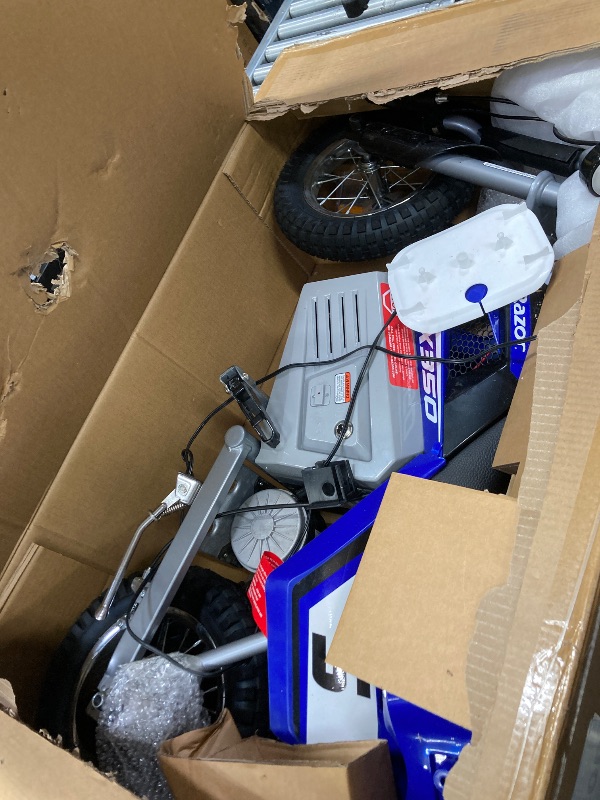 Photo 1 of **I DON'T KNOW IF THERE ARE MISSING PARTS** Razor MX350 Dirt Rocket Electric Motocross Bike, Blue, 10-12 inches