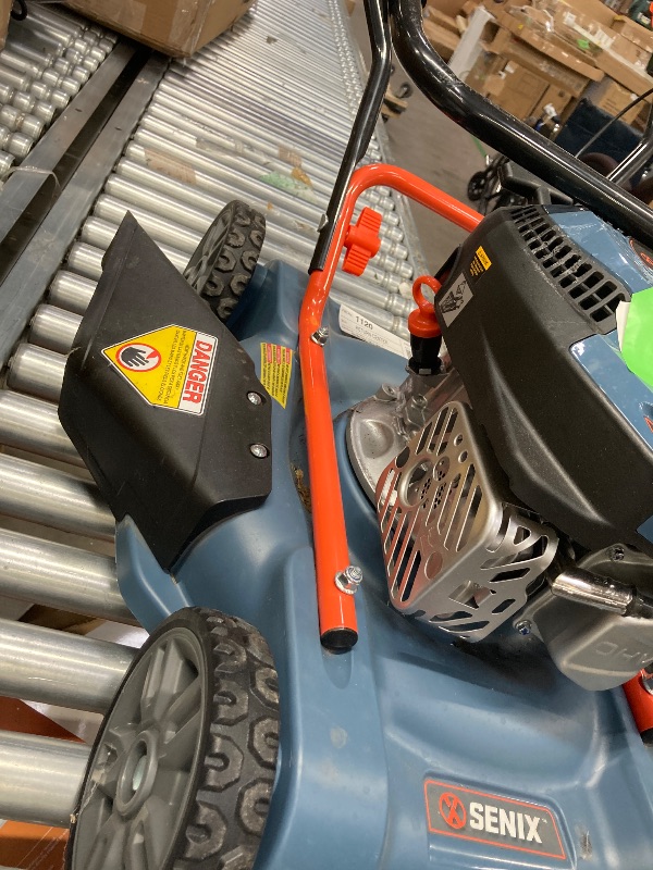 Photo 1 of ***I DON'T KNOW IF IT WORKS*********** SENIX Gas Lawn mower, 18in Cutting Blade / 19in Cutting Deck, 144cc 4-Cycle Engine Push Mower with Side Discharge
