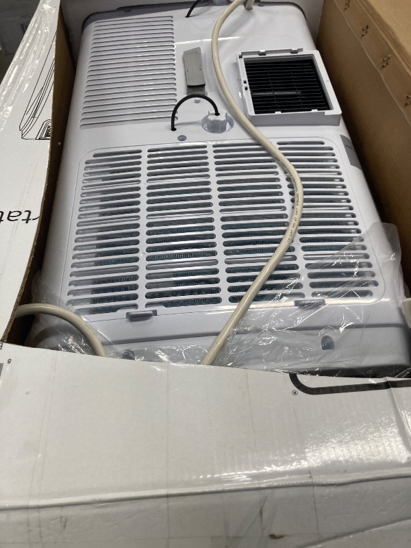 Photo 1 of *****It started and turned off, I don't know if it works*****BLACK+DECKER Portable Air Conditioner, 12,000 BTU (8,000 BTU SACC) for Rooms up to 550 Sq. Ft., Portable AC with Follow Me Remote Control and Window Kit, BPACT12WT, White