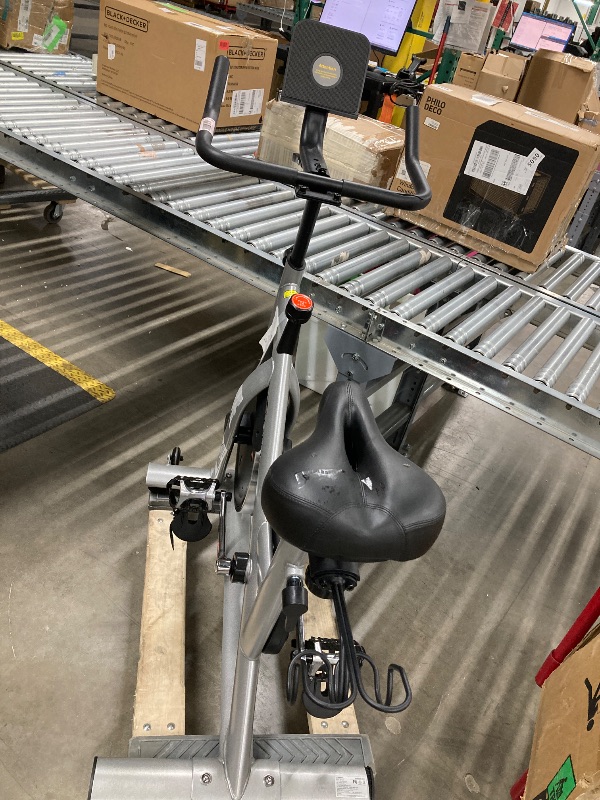 Photo 1 of ** is only to use for parts***MERACH Exercise Bike Brake Pad Stationary Bike with Exclusive App Low Noise Indoor Cycling Bike with 300lbs Weight Capacity Tablet Mount and Fitnes **USED**