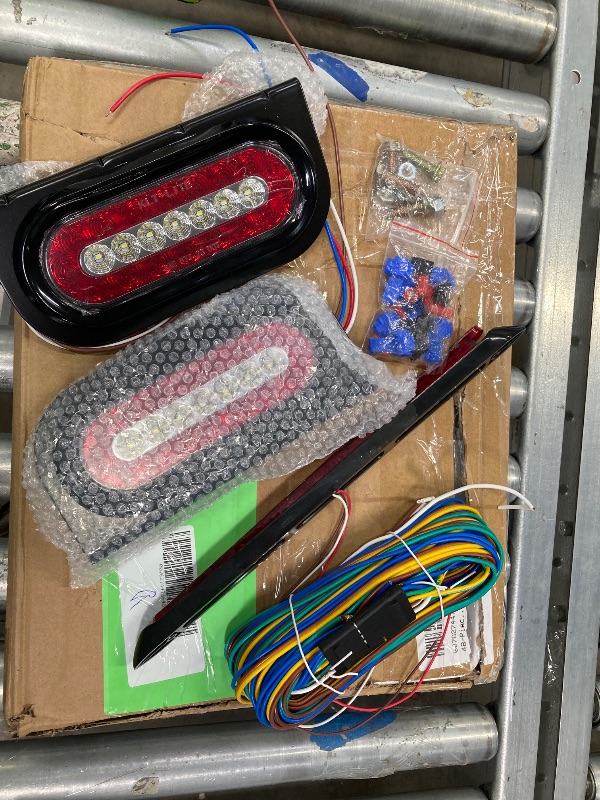 Photo 1 of **MISSING PARTS**6 inch Oval Led Trailer Lights Kit with Mounting Brackets,Light Bar and Wiring, 2PCS Waterproof Stop Brake and White Backup Reverse Lights for Boat RV Truck (Oval Led Trailer Lights Kit)