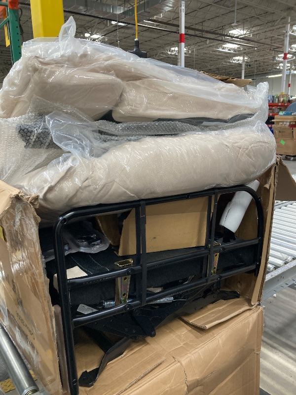 Photo 1 of *** unknown if missing pieces ****recliner chair color beige 