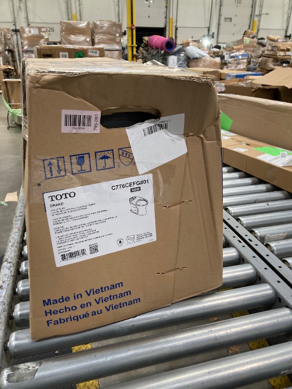 Photo 1 of **** PARTIAL SET**** TOTO Drake ONE-Piece Elongated 1.6 GPF Universal Height TORNADO FLUSH Toilet with CEFIONTECT, Cotton White - CST776CSFG#01