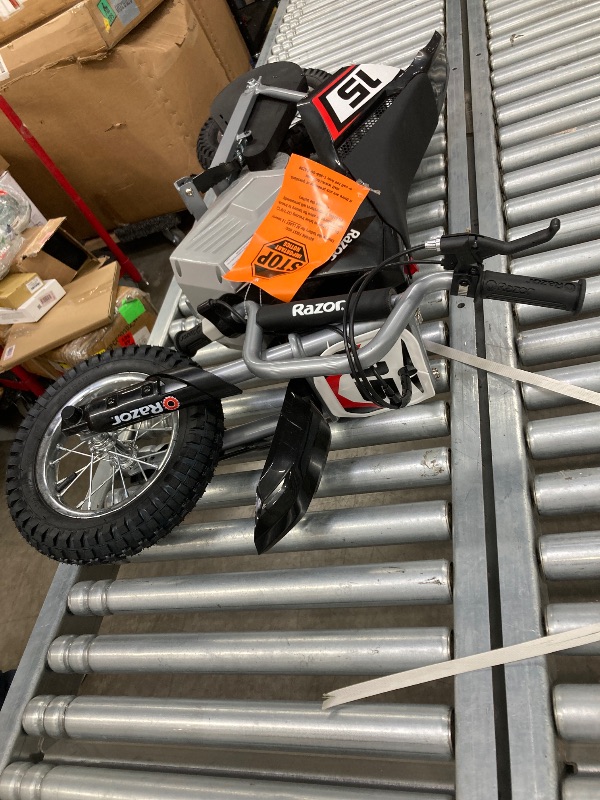 Photo 1 of  *** It is used, it is missing parts and has some minor scratches.****   Razor Dirt Rocket Pro Spec, Performance eMoto Motocross Bike for Off-Road Mature Riders, 16Y+, 1600W Motor, 48V Lithium-Ion Battery, Up to 28MPH, Front Suspension & Link Tuned Rear S