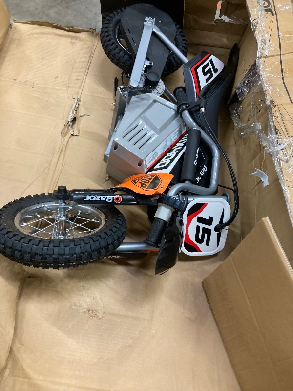 Photo 1 of  *** It is used, it is missing parts and has some minor scratches.****   Razor Dirt Rocket Pro Spec, Performance eMoto Motocross Bike for Off-Road Mature Riders, 16Y+, 1600W Motor, 48V Lithium-Ion Battery, Up to 28MPH, Front Suspension & Link Tuned Rear S