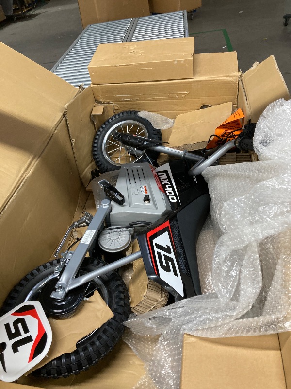 Photo 1 of  *** It is used, it is missing parts and has some minor scratches.****   Razor Dirt Rocket Pro Spec, Performance eMoto Motocross Bike for Off-Road Mature Riders, 16Y+, 1600W Motor, 48V Lithium-Ion Battery, Up to 28MPH, Front Suspension & Link Tuned Rear S