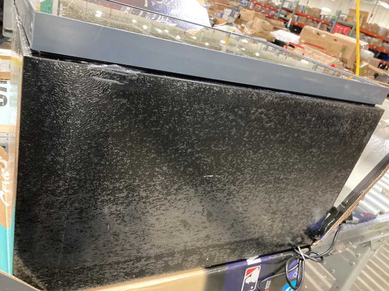 Photo 1 of ***NE SIDE OF THE DOOR IS DETACHED BECAUSE IT IS MISSING A SCREW**The product is used and was connected and turned on, but it is not known if it works at 100% because it has to be given time to cool down.BLACK+DECKER BD61526 Wine Cellar, Black Cabinet wit