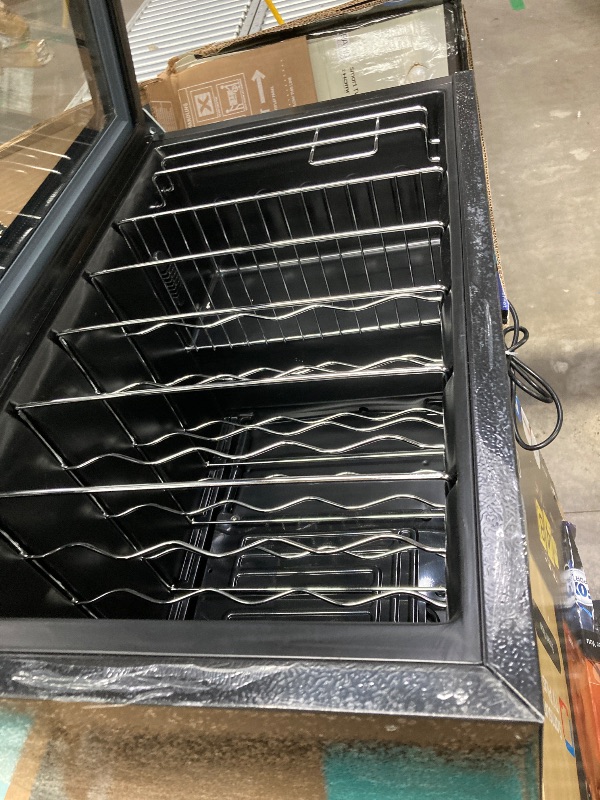 Photo 1 of ***NE SIDE OF THE DOOR IS DETACHED BECAUSE IT IS MISSING A SCREW**The product is used and was connected and turned on, but it is not known if it works at 100% because it has to be given time to cool down.BLACK+DECKER BD61526 Wine Cellar, Black Cabinet wit