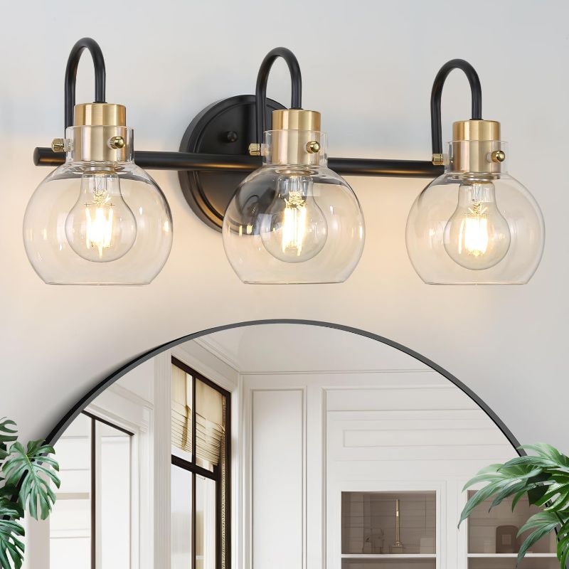 Photo 1 of **not the same but similar** 3 Lights Bathroom Light, Black Gold Vanity Light Fixture, Wall Sconces with Globe Clear Glass Shade, Farmhouse Wall Mount Lamp for Mirror, Kitchen, Porch, Living Room, Workshop