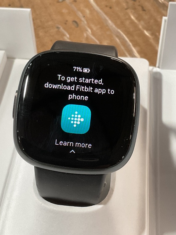 Photo 1 of ***(MAJOR DAMAGE/ SEE NOTES FOR DETAILS)***Fitbit Versa 4 Fitness Smartwatch with Daily Readiness, GPS, 24/7 Heart Rate, 40+ Exercise Modes, Sleep Tracking and more, Black/Graphite, One Size (S & L Bands Included)