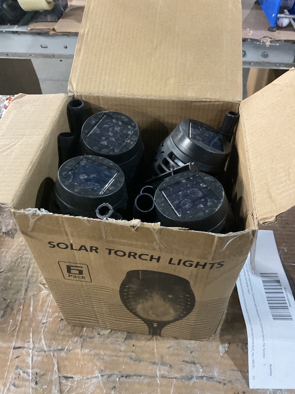 Photo 1 of ***(PARTS ONLY/ NON FUNCTIONAL)***Outdoor Solar Lights, 6Pack Solar Torch Light with Flickering Flame, Christmas Lights Waterproof for Christmas Decor, Tiki Torches for Outside, Luces Solares para Exteriores Pathway Yard Garden Decor