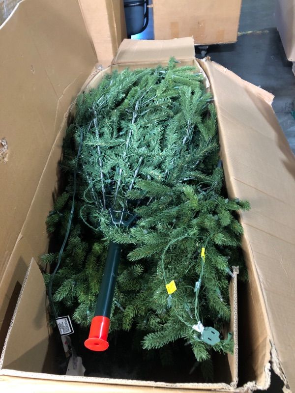 Photo 1 of ***DAMAGED LIGHTS DO NOT WORK*** National Tree Company 7.5 ft Pre-Lit Jersey Fraser Fir Artificial Christmas Tree, 1,250 Clear Lights, 3,144 Tips, Includes Stand, Green