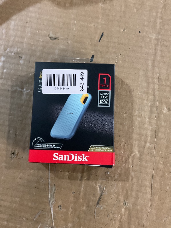 Photo 1 of ***LIKE NEW/OPEN BOX***
SanDisk 1TB Extreme Portable SSD - Up to 1050MB/s, USB-C, USB 3.2 Gen 2, IP65 Water and dust Resistance, Updated Firmware, Sky Blue - External Solid State Drive - SDSSDE61-1T00-G25B