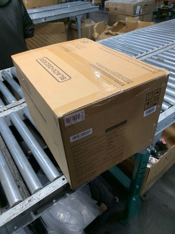 Photo 1 of ***FACTORY SEALED*** BLACK+DECKER Digital Microwave Oven with Turntable Push-Button Door, Child Safety Lock, Stainless Steel, 0.9 Cu Ft