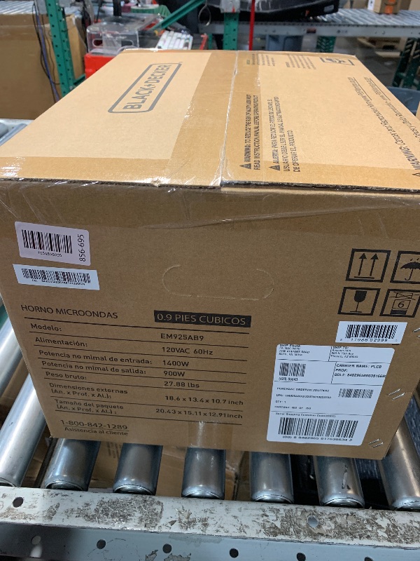 Photo 1 of BLACK+DECKER Digital Microwave Oven with Turntable Push-Button Door, Child Safety Lock, Stainless Steel, 0.9 Cu Ft