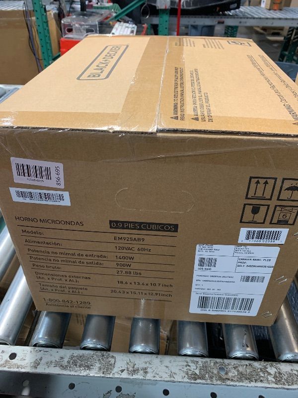 Photo 1 of ***FACTORY SEAL***BLACK+DECKER Digital Microwave Oven with Turntable Push-Button Door, Child Safety Lock, Stainless Steel, 0.9 Cu Ft